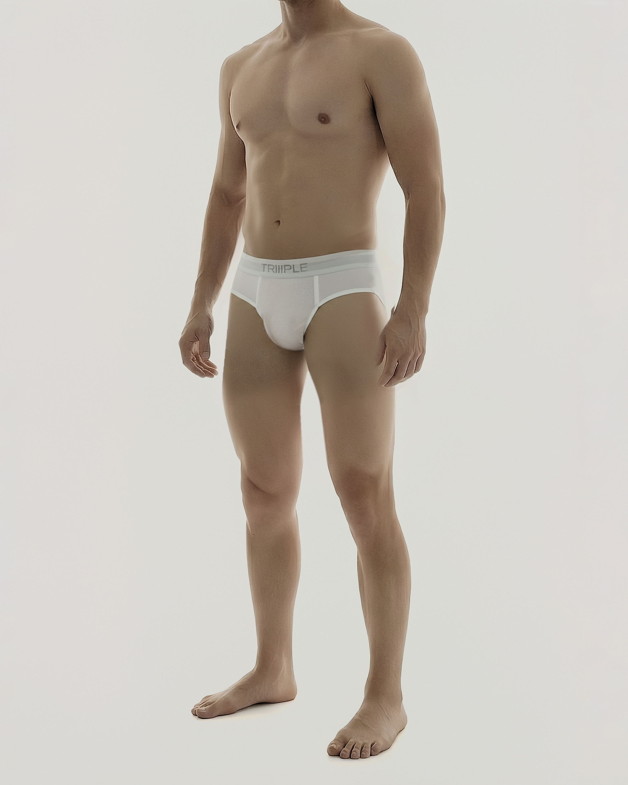 Man wearing a white underwear on a plain background